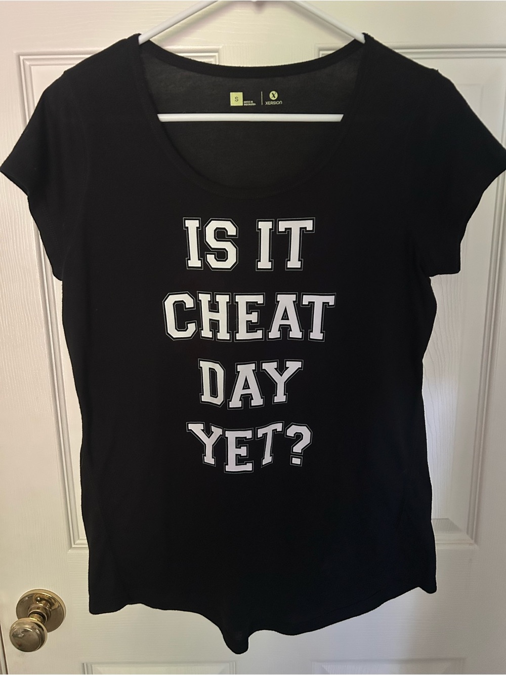 Women’s Xersion Black Short Sleeve Tee with White Graphic Text, Small